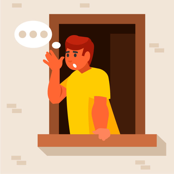 Mann spricht am Fenster