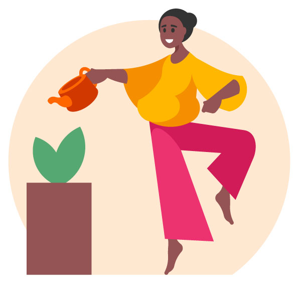 Mujer regando una planta